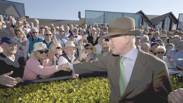 <p>Willie Mullins acknowledges his supporters at Punchestown 	 Photo: Patrick McCann/Racing Post </p>