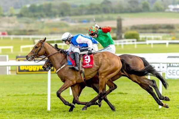 Danny Mullins on Beauvallon holds off the challenge from Jack Kennedy on Immediate Effect to win The Specialist Group Novice Hurdle	Photo: ©INPHO/Morgan Treacy