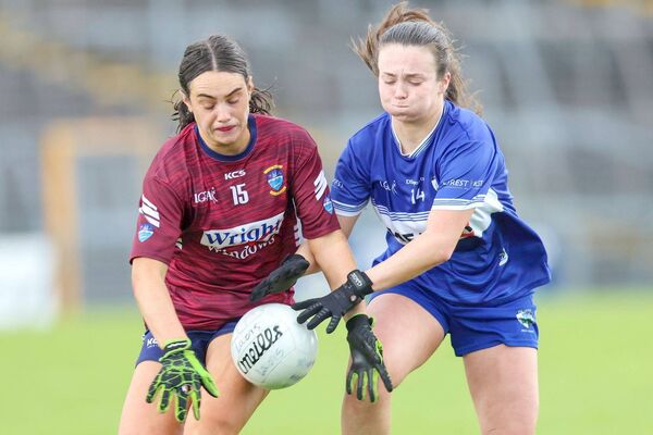Laois's Katie Donoghue and Westmeath's Rebecca Higgins tussle for possession Photo: Paul Dargan