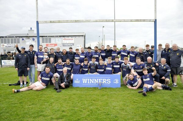 The Portlaoise team with the Michael Dunne Cup after their win over Carlow in the final on Sunday in Athy Photo: Martin Rowe