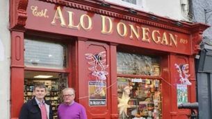 <p>Father and son Kevin (left) and Eamonn Donegan outside the famous store. Photo: Alo Donegan &amp; Sons</p>