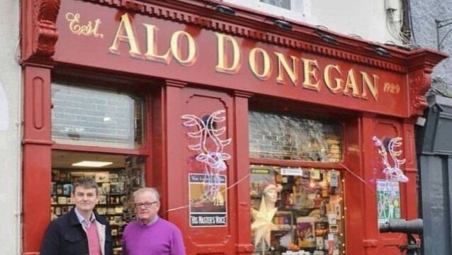 <p>Father and son Kevin (left) and Eamonn Donegan outside the famous store. Photo: Alo Donegan &amp; Sons</p>