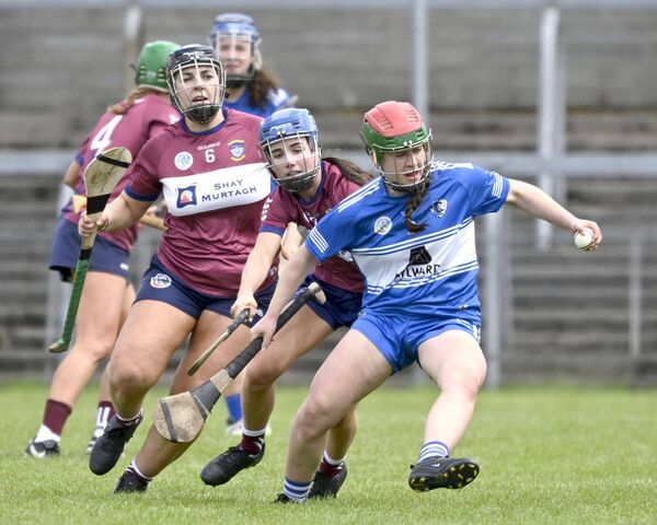 Laois's Amy Lacey gets away from Westmeath's Laura Doherty in the Leinster final