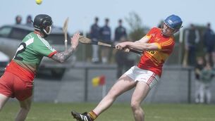 <p>Ross Deegan pointing this sliotar between the posts for The Harps.</p> <p>Ross Deegan pointing this sliotar between the posts for The Harps.</p>