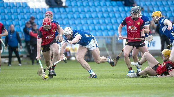 Laois's Ryan Mullaney vies for the sliotar with Pearse Óg McCrickard (Down) in their Joe McDonagh Cup game on Saturday Photo: Denis Byrne Laois's Ryan Mullaney vies for the sliotar with Pearse Óg McCrickard (Down) in their Joe McDonagh Cup game on Saturday Photo: Denis Byrne