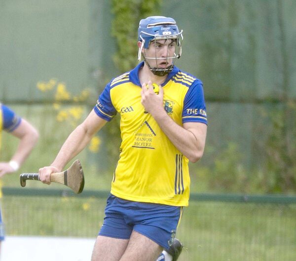 Stephen O'Donnell (Abbeyleix) in possession and breaking against Portlaoise Photo: Denis Byrne