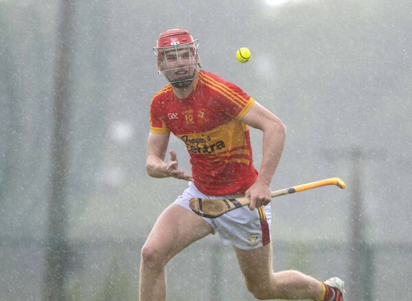 Rory Dunne (The Harps) gathers the sliotar in their ACHL Division 1 win over Rathdowney/Errill on Sunday Photo: Denis Byrne Rory Dunne (The Harps) gathers the sliotar in their ACHL Division 1 win over Rathdowney/Errill on Sunday Photo: Denis Byrne