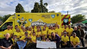 <p>Clonaslee High Nelly Club presented the huge cheque to delighted BUMBLEance volunteers on 16 May. Photo: Clonaslee High Nelly Club</p>