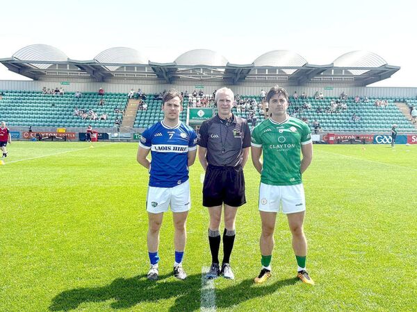 Laois and London captains, Brian Byrne and Liam Gallagher with referee Fergal Kelly prior to throw-in for the Tailteann Cup game in Ruislip on Saturday Photo courtesy CLG Laois
