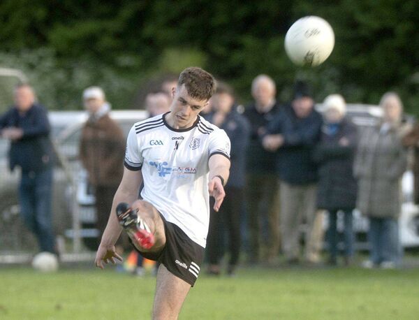 Eanna Byrne (Arles Killeen) lands a point with this effort Photo: Denis Byrne Eanna Byrne (Arles Killeen) lands a point with this effort Photo: Denis Byrne