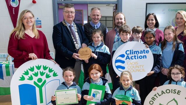 <p>Holy Family Senior School Green Schools Committee pupils at the Portlaoise Cluster Project Awards with Allison Phillips, Green-Schools Travel Programme Manager; LCC deputy cathaoirleach Cllr Paschal McEvoy; LCC director of services Pat Delaney: LCC Environmental Awareness Officer Steven Mullally; Anne Marie O'Hara, Green Schools Coordinator, Holy Family Senior School; Dr Faye Carroll, principal officer in the Active Travel and Greenway Division of the Department of Transport and Cathy Baxter, director, Environmental Education Unit, An Taisce. Photo: Alf Harvey</p>