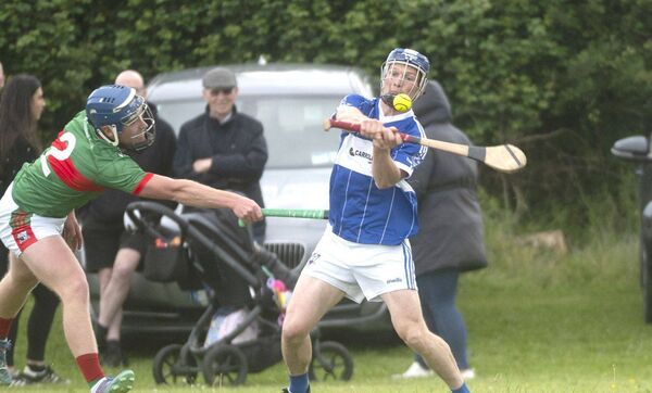 Brendan Reddin (Castletown) playing for a score against Rathdowney/Errill Photo: Denis Byrne Brendan Reddin (Castletown) playing for a score against Rathdowney/Errill Photo: Denis Byrne