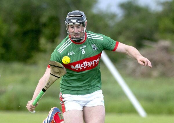 Rathdowney/Errill's Patrick Purcell in controls this sliotar Photo: Denis Byrne Rathdowney/Errill's Patrick Purcell in controls this sliotar Photo: Denis Byrne