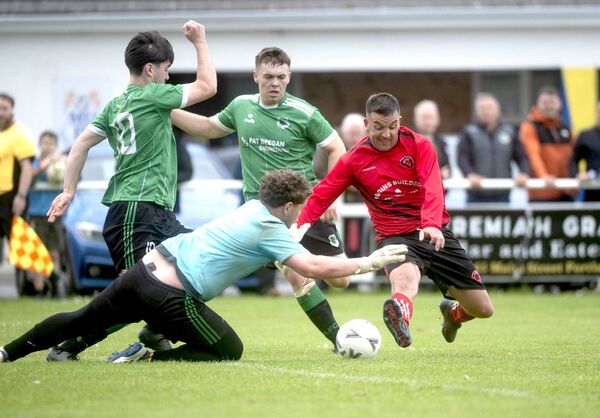 Anthony Skelly (Stradbally Town) gets down quickly to deny Eamon Kelly (Gracefield) a goal in the S+CCFL Division 3 Shield final Photo: Denis Byrne