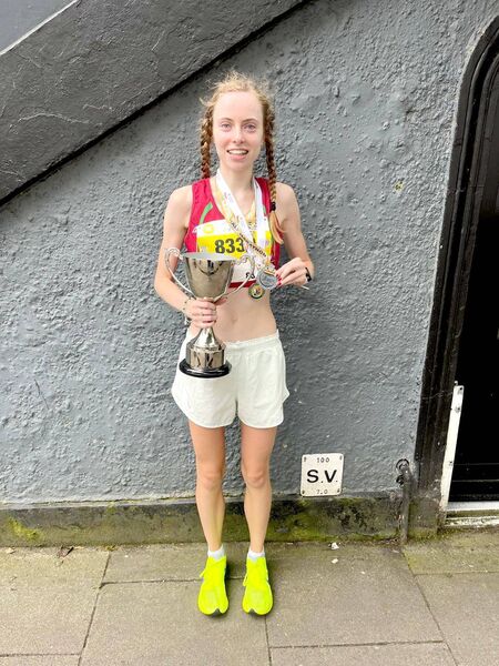 Heather Murphy with the Cark Half Marathon trophy and winner's medal Heather Murphy with the Cark Half Marathon trophy and winner's medal