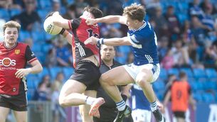 <p>High jinks as Simon Fingleton (Laois) challenges Daniel Guinness (Down) for this ball in their Tailteann Cup quarter-final at Laois Hire O'Moore Park on Saturday Photo: Denis Byrne</p> <p>High jinks as Simon Fingleton (Laois) challenges Daniel Guinness (Down) for this ball in their Tailteann Cup quarter-final at Laois Hire O'Moore Park on Saturday Photo: Denis Byrne</p>