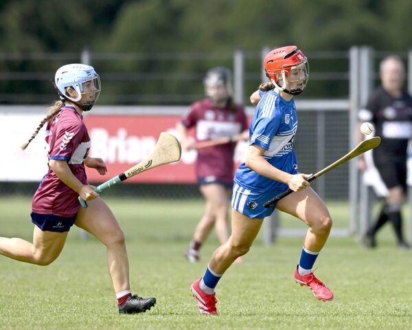 Laois's Kaylee O'Keeffe breaks away from Westmeath's Erin Core Photo: John McCauley Laois's Kaylee O'Keeffe breaks away from Westmeath's Erin Core Photo: John McCauley