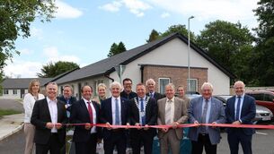 <p>Cllr Barry Walsh Cutting the ribbon at the opening of the new homes at Wallis Street, Mountrath, with Cllr James Kelly, Cllr John King, Deputy Seán Fleming, T.D., Donal Brennan (Director of Services at Laois Co Council), Deputy Willie Aird, T.D., Cllr John King, Deputy Brian Stanley, T.D. and Chief Executive of Laois County Council, Michael Rainey; and Laois Co Council staff: Rachel Doheny, Trevor Hennessy, Louise McEvoy and Aislinn Townsend Photo: Michael Scully </p> <p>Cllr Barry Walsh Cutting the ribbon at the opening of the new homes at Wallis Street, Mountrath, with Cllr James Kelly, Cllr John King, Deputy Seán Fleming, T.D., Donal Brennan (Director of Services at Laois Co Council), Deputy Willie Aird, T.D., Cllr John King, Deputy Brian Stanley, T.D. and Chief Executive of Laois County Council, Michael Rainey; and Laois Co Council staff: Rachel Doheny, Trevor Hennessy, Louise McEvoy and Aislinn Townsend Photo: Michael Scully </p>