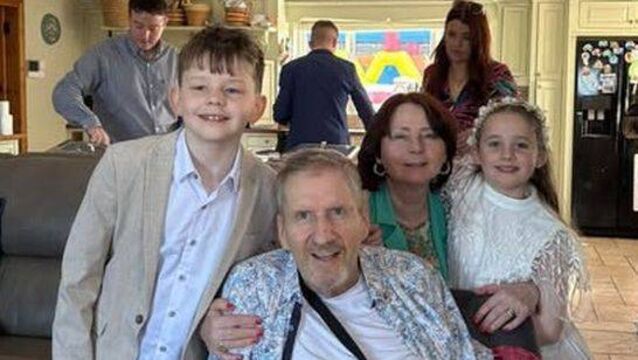 <p>A treasured photo of Noel Tuohy and his wife Cllr Marie Tuohy with their two granchildren on their First Holy Communion day in May, when he got "temporary release" from hospital. Photo: Noel Tuohy</p>