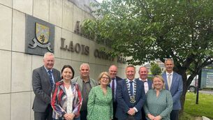 <p>Laois Co Council officials Simon Walton and Wes Wilkinson with new chair of Portlaoise MD Cllr Barry Walsh and vice chair Cllr Catherine Fitzgerald after their election on 17 June, with Cllr Marie Tuohy, Cllr Pady Buggy, Cllr John Joe Fennelly, Cllr Tommy Mulligan and Cllr Caroline Dwane Stanley. Photo: Laois Co Council </p> <p>Laois Co Council officials Simon Walton and Wes Wilkinson with new chair of Portlaoise MD Cllr Barry Walsh and vice chair Cllr Catherine Fitzgerald after their election on 17 June, with Cllr Marie Tuohy, Cllr Pady Buggy, Cllr John Joe Fennelly, Cllr Tommy Mulligan and Cllr Caroline Dwane Stanley. Photo: Laois Co Council </p>