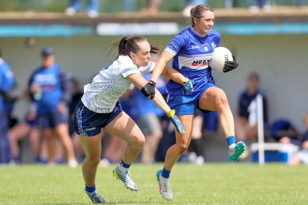 Laois's Anna Healy breaks through this tackle Photo: Paul Dargan