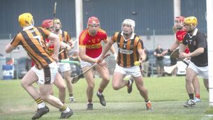 <p>Eoin Gaughan (Camross) bringing this ball clear in the ACHL Division 2 final 	 Photo: Denis Byrne</p>