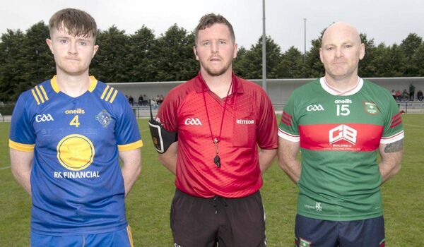 Captains Ronan Stapleton (Annanough) and Rory Hurley (Graiguecullen) with referee Jamie McDonald ahead of throw in for the ACFL Division 4 final on Wednesday Photo: Denis Byrne Captains Ronan Stapleton (Annanough) and Rory Hurley (Graiguecullen) with referee Jamie McDonald ahead of throw in for the ACFL Division 4 final on Wednesday Photo: Denis Byrne