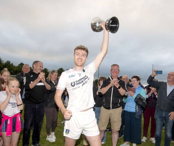 Courtwood captain Sean O'Flynn raising the ACFL Division 1 trophy on Saturday night Photo: Denis Byrne Courtwood captain Sean O'Flynn raising the ACFL Division 1 trophy on Saturday night Photo: Denis Byrne