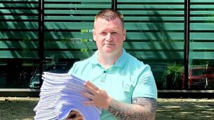 <p>Sinn Féin representative in Laois, Aaron Kelly, holding submissions against the proposed cycle scheme in Graiguecullen. </p> <p>Sinn Féin representative in Laois, Aaron Kelly, holding submissions against the proposed cycle scheme in Graiguecullen. </p>