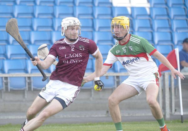 Ballinakill's Cathal O'Shaughnessy gives Rathdowney/Errill's Eoin Bracken the slip on Saturday's SHC Rd 1 game Photo: Denis Byrne Ballinakill's Cathal O'Shaughnessy gives Rathdowney/Errill's Eoin Bracken the slip on Saturday's SHC Rd 1 game Photo: Denis Byrne