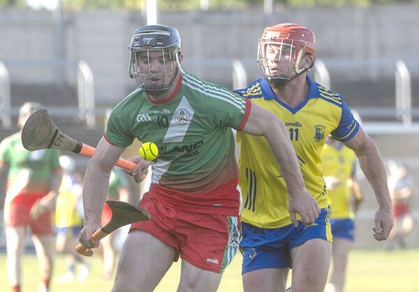 PJ Kelly (Borris/Kilcotton) breaking with Fionan Mahony (Abbeyleix) at his heels Photo: Denis Byrne PJ Kelly (Borris/Kilcotton) breaking with Fionan Mahony (Abbeyleix) at his heels Photo: Denis Byrne