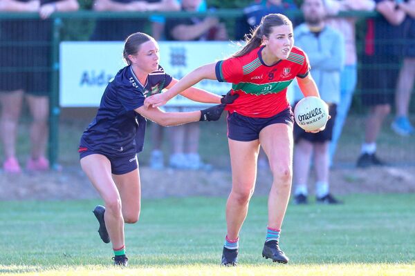 Timahoe's Sarah Deegan manages to get her pass away despite being put under pressure Photo: Paul Dargan Timahoe's Sarah Deegan manages to get her pass away despite being put under pressure Photo: Paul Dargan