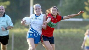 <p>Ava Galvin (St Conleth's) shielding this ball as Sarah Larkin (Timahoe) looks to dispossess 	Photo: Denis Byrne</p>