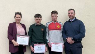 <p>St Fergal’s College principal Carole Devine with award-winners Emmanuel Collins Begadon, MJ Muldowney and former deputy principal PJ Delaney. Photo: CPR 4 Schools</p>