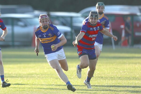 Kyle Handcock (Clough/Ballacolla) gets away from Ben McDonald (Colt-Shanahoe) Photo: David Maher Kyle Handcock (Clough/Ballacolla) gets away from Ben McDonald (Colt-Shanahoe) Photo: David Maher