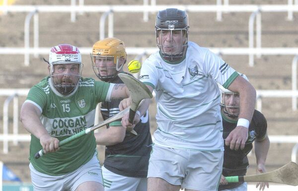 Rosenallis goalkeeper Stephen Lowry bursts clear with this sliotar with Christopher Dunne (Ballyfin) giving chase in their Senior Hurling Championship Rd 2 game on Thursday Photo: Denis Byrne Rosenallis goalkeeper Stephen Lowry bursts clear with this sliotar with Christopher Dunne (Ballyfin) giving chase in their Senior Hurling Championship Rd 2 game on Thursday Photo: Denis Byrne