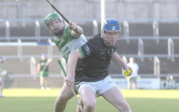 Oran Gorman (Rosenallis) in possession with Gary Hoffmeister (Ballyfin) looking to challenge Photo: Denis Byrne Oran Gorman (Rosenallis) in possession with Gary Hoffmeister (Ballyfin) looking to challenge Photo: Denis Byrne