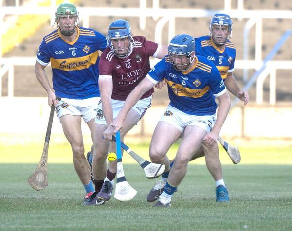 Brian Duggan (Ballinakill) and Joe Corby (Clough/Ballacolla) compete for this sliotar Photo: Denis Byrne Brian Duggan (Ballinakill) and Joe Corby (Clough/Ballacolla) compete for this sliotar Photo: Denis Byrne