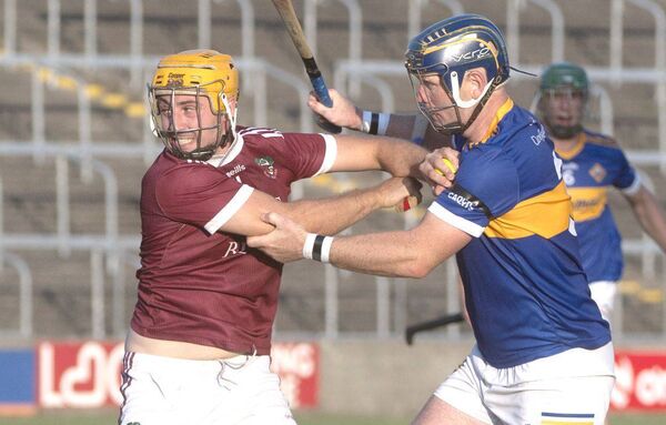 Ballinakill captain Seamus Fitzpatrick in possession with Darren Maher (Clough/Ballacolla) challenging Photo: Denis Byrne Ballinakill captain Seamus Fitzpatrick in possession with Darren Maher (Clough/Ballacolla) challenging Photo: Denis Byrne