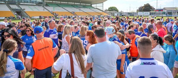 Laois supporters soak up the atmosphere in Glenisk O'Connor Park on Saturday	Photo: Paul Dargan