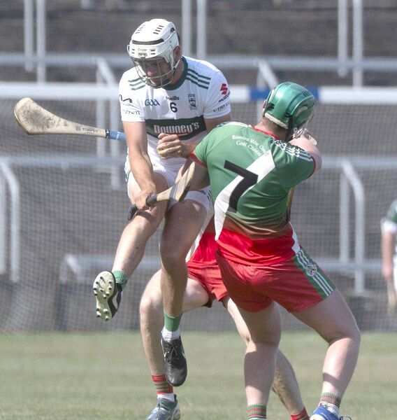 Cormac Rigney (Portlaoise) and Niall Coss (Borris/Kilcotton) collide during their SHC Rd 2 game on Saturday Photo: Denis Byrne Cormac Rigney (Portlaoise) and Niall Coss (Borris/Kilcotton) collide during their SHC Rd 2 game on Saturday Photo: Denis Byrne