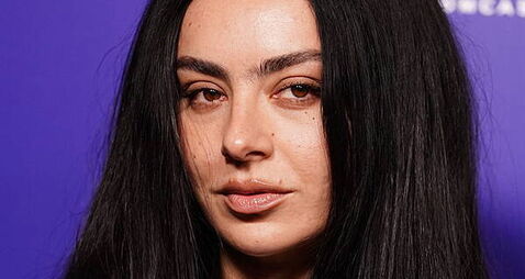 Charli XCX steps onto film set with Vincent Cassel in new music video