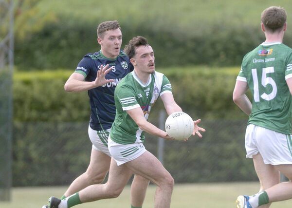 Michael Gaffney (Killeshin) laying this ball with Eoin Buggy (Stradbally) keeping close Photo: Denis Byrne Michael Gaffney (Killeshin) laying this ball with Eoin Buggy (Stradbally) keeping close Photo: Denis Byrne