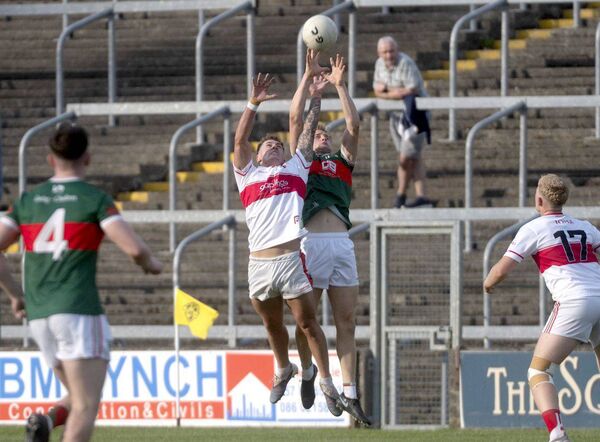 Padraig Kirwan (Emo) and Josh O'Brien (Graiguecullen) compete for this ball in their SFC Rd 1 game on Wednesday Photo: Denis Byrne Padraig Kirwan (Emo) and Josh O'Brien (Graiguecullen) compete for this ball in their SFC Rd 1 game on Wednesday Photo: Denis Byrne