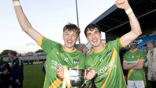<p>Jim and Fionn Holland celebrate their 2025 IHC final win 	Photo: Denis Byrne</p>