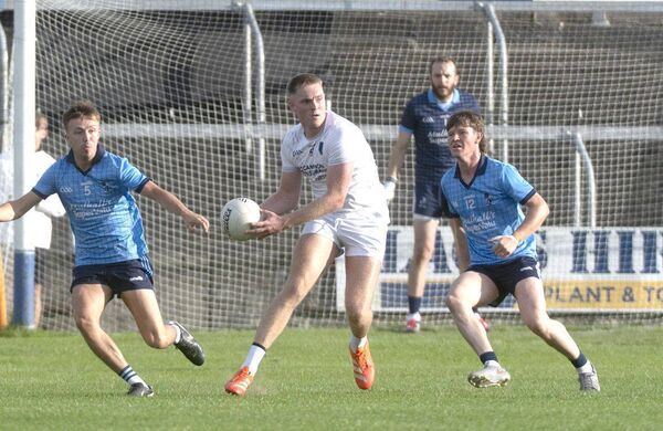 Courtwood's Robert Tyrrell takes evasive action in their SFC Rd 2 win over Ballyroan Abbey at Laois Hire O'Moore Pak on Saturday 	 Photo: Denis Byrne
