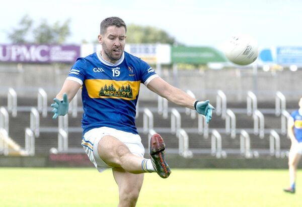 Brian Nugent (O'Dempsey's) goes for a score during their Senior Championship win over Emo Photo: Denis Byrne Brian Nugent (O'Dempsey's) goes for a score during their Senior Championship win over Emo Photo: Denis Byrne