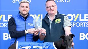 <p>Tye Adamson Presents the trophy to Karol Ramsbottom after Kapuka Coley won Heat 17 Round One of The BoyleSports Irish Greyhound Derby</p> <p>Tye Adamson Presents the trophy to Karol Ramsbottom after Kapuka Coley won Heat 17 Round One of The BoyleSports Irish Greyhound Derby</p>