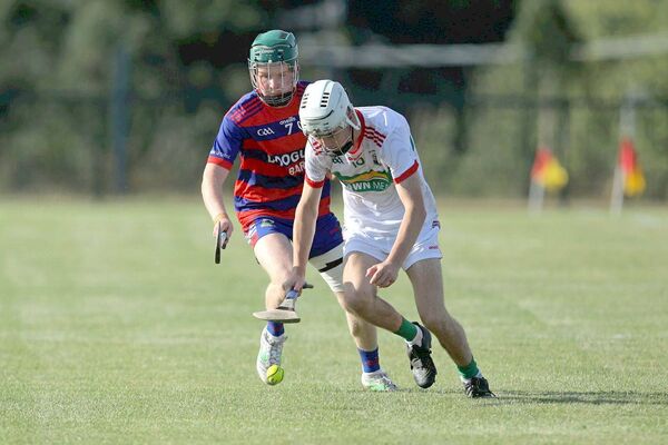 Harry Campion (Rathdowney/Errill) gets to the sliotar ahead of the challenging Cullan Kirwan (Colt-Shanahoe) Photo: David Maher Harry Campion (Rathdowney/Errill) gets to the sliotar ahead of the challenging Cullan Kirwan (Colt-Shanahoe) Photo: David Maher