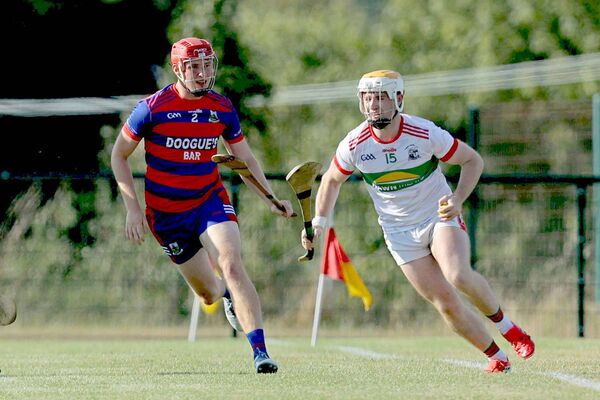 Daniel Butler (Colt-Shanahoe) moves in on the attacking Patrick Hassett ( Rathdowney/Errill) in their PIHC Rd 3 game Photo: David Maher Daniel Butler (Colt-Shanahoe) moves in on the attacking Patrick Hassett ( Rathdowney/Errill) in their PIHC Rd 3 game Photo: David Maher